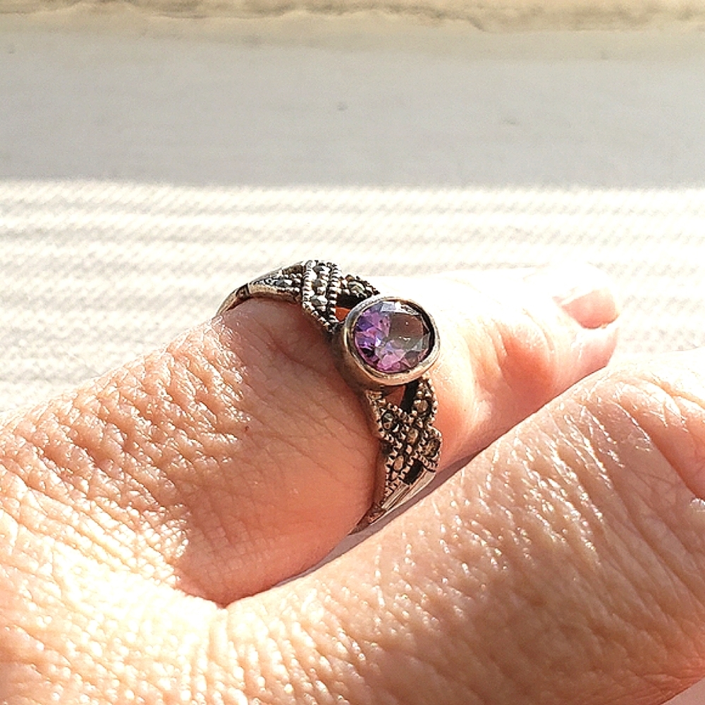 amethyst with marcasite  design on each side.. sterling silver rin…